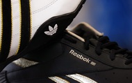 Adidas   Reebok -   $2,2 